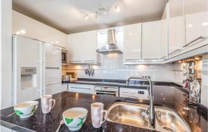 A kitchen or kitchenette at Gorgeous Apartment In Calahonda