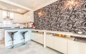 A kitchen or kitchenette at Gorgeous Apartment In Calahonda
