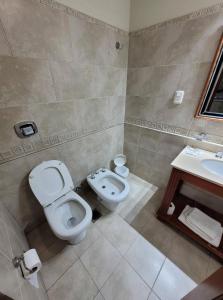 Un baño de Hotel Pórtico Norte