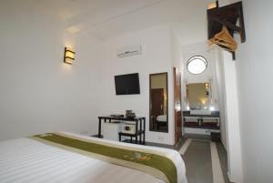 Letto o letti in una camera di The Columns