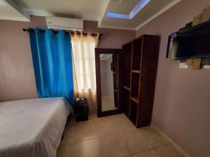 Postel nebo postele na pokoji v ubytování Sunset Bay House