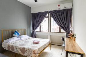 Postel nebo postele na pokoji v ubytování Mac Inn 94