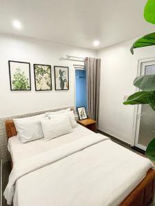 Postel nebo postele na pokoji v ubytování Dalat Topview Homestay