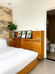Postel nebo postele na pokoji v ubytování Dalat Topview Homestay