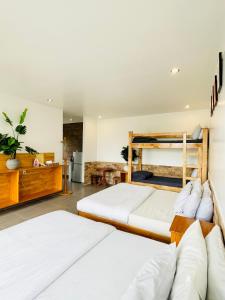 Postel nebo postele na pokoji v ubytování Dalat Topview Homestay