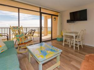 a living room with a couch and a table at LR 403 - Destination Relaxation in Rockport