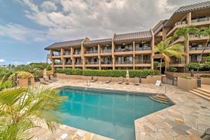 an exterior view of a resort with a swimming pool at Sohana Lifestyle Apartment I Leeven's Home I Kona in Kailua-Kona