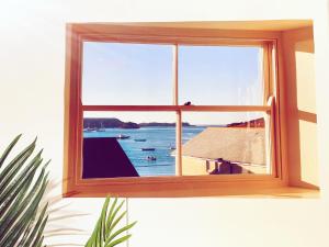 a window with a view of the ocean at Tranquilo paradise in Seoul