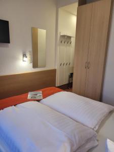 Postel nebo postele na pokoji v ubytování Hotel Restaurant Ruppert