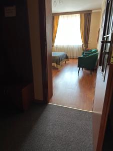 Postel nebo postele na pokoji v ubytování Yunist