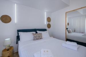 Postel nebo postele na pokoji v ubytování Lucky Suites