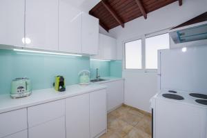 Kuchyň nebo kuchyňský kout v ubytování Lucky Suites