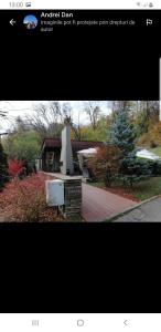 a picture of a house and a picture of a house at Apartament Simona in Braşov