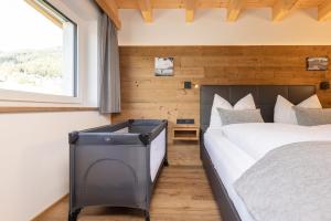 Łóżko lub łóżka w pokoju w obiekcie Apartments am Bichl