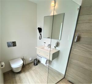 Koupelna v ubytování Hotel Skivehus