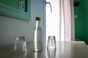 Nápoje v ubytování Mirtos Hotel + 29 fotografií