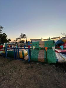 a fence with colorful flags on top of it at Düden Dream in Antalya