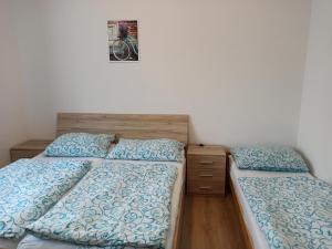 Postel nebo postele na pokoji v ubytování Holiday House Adrelot