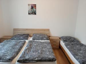 Postel nebo postele na pokoji v ubytování Holiday House Adrelot