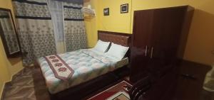 Katil atau katil-katil dalam bilik di Hotel Parichit