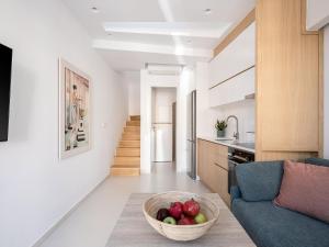 Kuchyň nebo kuchyňský kout v ubytování Mythodea Luxury Suites