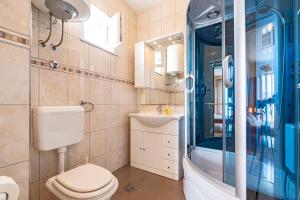 Koupelna v ubytování Siriščević Apartment + 32 fotografií