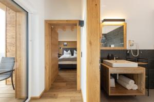 Łóżko lub łóżka w pokoju w obiekcie Apartments am Bichl