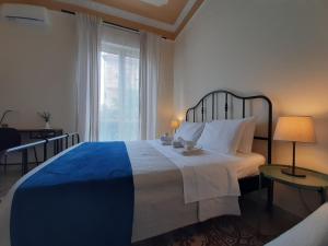 Posteľ alebo postele v izbe v ubytovaní "RUNFULÌA" Deluxe apartment