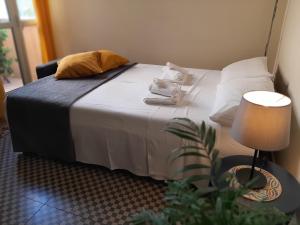 Posteľ alebo postele v izbe v ubytovaní "RUNFULÌA" Deluxe apartment