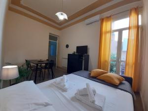Posteľ alebo postele v izbe v ubytovaní "RUNFULÌA" Deluxe apartment