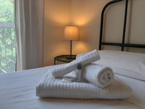 Posteľ alebo postele v izbe v ubytovaní "RUNFULÌA" Deluxe apartment