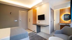 Μια τηλεόραση ή/και κέντρο ψυχαγωγίας στο HOTEL DESTİLL +36 φωτογραφίες