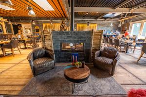 Posezení v ubytování EuroParcs Poort van Zeeland + 24 fotografií