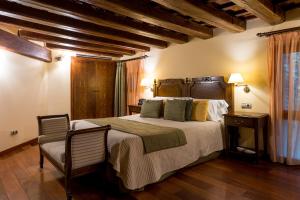 Posteľ alebo postele v izbe v ubytovaní Hotel Villa Retiro