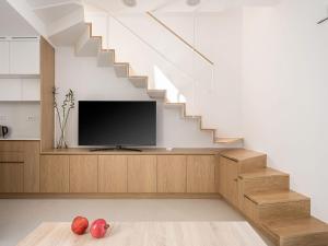 TV a/nebo společenská místnost v ubytování Mythodea Luxury Suites