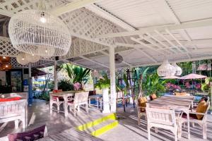 Restoran või mõni muu söögikoht majutusasutuses Baan Bua Cottage