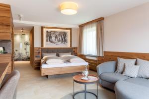 Postel nebo postele na pokoji v ubytování Biohotel Eggensberger