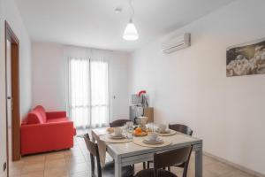 Area soggiorno di Apartments in residence with swimming pool in Villasimius