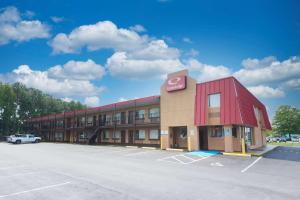 a building with a sign on it in a parking lot at Econo Lodge Town Center in Virginia Beach