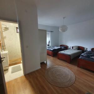Voodi või voodid majutusasutuse Che Private Rooms Banovci toas