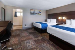 Postel nebo postele na pokoji v ubytování Travelodge by Wyndham Florence
