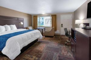 Postel nebo postele na pokoji v ubytování Travelodge by Wyndham Florence + 26 fotografií