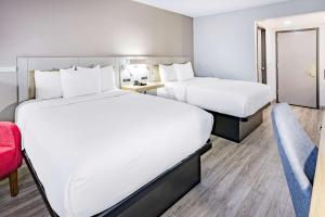 Krevet ili kreveti u jedinici u okviru objekta Wingate by Wyndham Fishkill