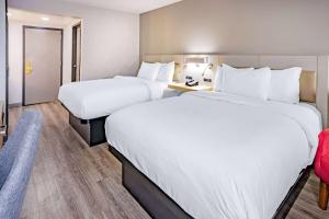 Krevet ili kreveti u jedinici u okviru objekta Wingate by Wyndham Fishkill