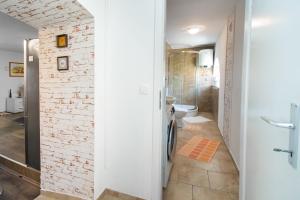 Koupelna v ubytování Apartment Kameni dvori