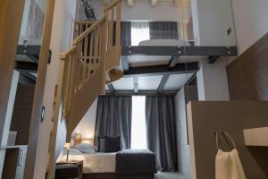 Postel nebo postele na pokoji v ubytování Hotel San Giacomo Spa&Gourmet