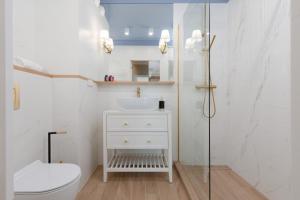 Kúpeľňa v ubytovaní Wyspa Solna Kołobrzeg by Renters Prestige + 37 fotografií