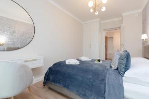Posteľ alebo postele v izbe v ubytovaní Wyspa Solna Kołobrzeg by Renters Prestige