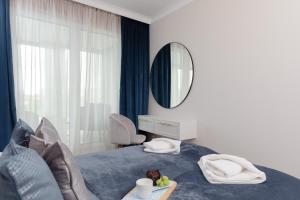 Posteľ alebo postele v izbe v ubytovaní Wyspa Solna Kołobrzeg by Renters Prestige