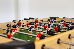 a group of toy figurines of people in a gym at Station Lodge close to City Centre with parking in Exeter